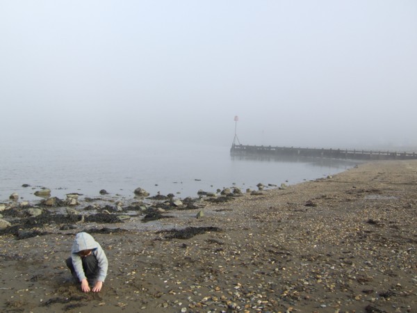 a beach next to a Goodwick causeway